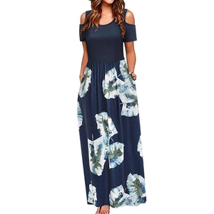 Detail of dark blue cold shoulder maxi dress featuring white leaf print and side pockets