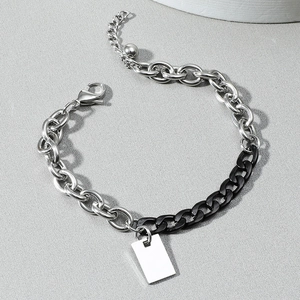 Two-tone silver and black mixed chain bracelet with rectangular tag and lobster clasp