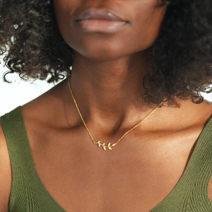 925 silver golden olive branch necklace with zircon leaves worn on neck