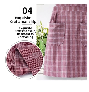 Detail of red gingham cotton apron showing reinforced double pockets and fine stitching
