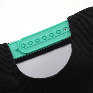 Adjustable black flat brim hip hop hat with mint green snapback closure detail