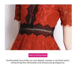 Detail of red lace dress showing black hollow-out embroidery waist stitching and texture
