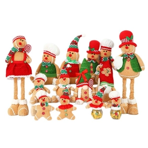 Knitted gingerbread man doll ornaments and storage jars for Christmas tree decorations