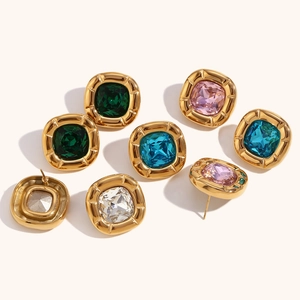 Detailed macro view showing square gemstone stud earrings with 18K gold plated metal edges