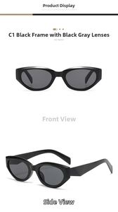 Detail view of glossy black cat-eye sunglasses with dark grey resin lenses and integrated nose pads