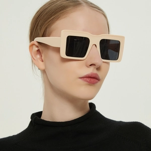 Oversized beige rectangle sunglasses with black lenses for a trendy fashion look