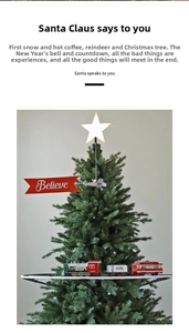 Illuminated star tree topper with rotating train track and retro steam locomotive