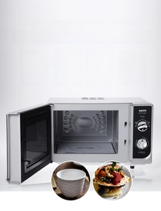 Detail view of European ceramic teapot set showing dishwasher and microwave compatibility