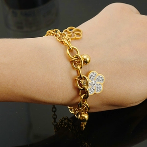 18K gold-plated stainless steel rose bracelet with rhinestones on female wrist