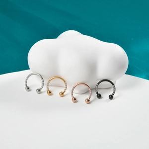 U-shaped stainless steel septum rings with white zircon in gold, silver, and black colors
