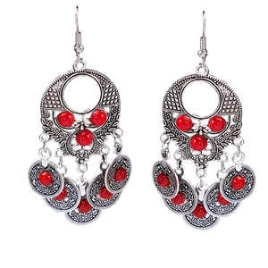 Bohemian silver earrings with vintage ethnic hollow discs and red bead tassels