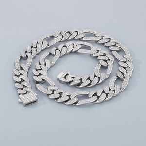 Detail of silver iced-out Cuban link necklace with rhinestone pavé and box clasp
