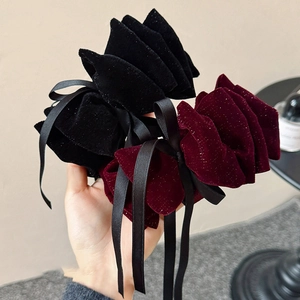 Elegant velvet bow hair clip with satin ribbons in black and burgundy red colors