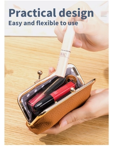 Brown leather mini pouch showing practical dotted lining and lipstick storage