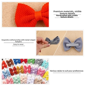 Detailed view of handmade textured waffle fabric bows with secure silver metal clips