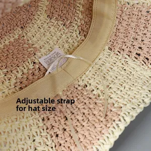 Detailed view of the adjustable drawstring inside a women's hand-woven summer straw hat