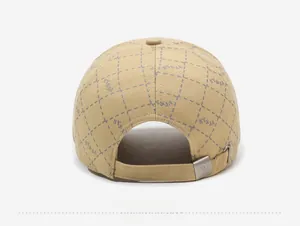 Detail of khaki baseball cap back with lattice embroidery and adjustable metal buckle