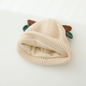 Detailed close-up of ribbed knit texture and soft lining on the baby winter hat