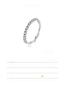 Macro detail of S925 sterling silver ring band with pave-set sparkling cubic zirconia