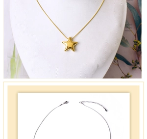 Detail of star pendant necklace showing the lobster clasp and adjustable extension chain