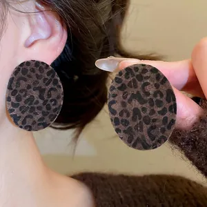 Flocculent oval leopard print stud earrings for women with silver pins in brown