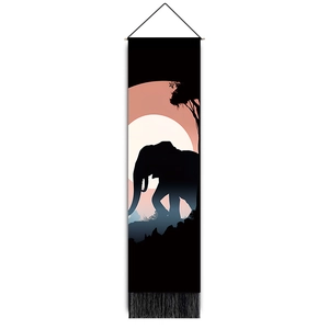 Detail of forest animal silhouette tapestry with elephant pattern and black tassels