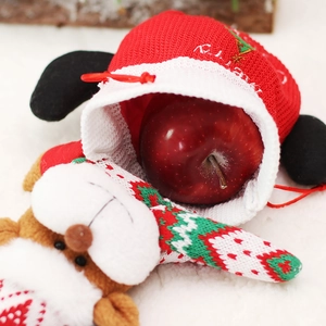 Christmas knitted drawstring gift bag with Santa belt design and fresh red apple inside