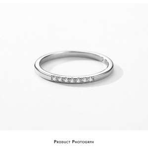 Macro shot of silver S925 sterling silver ring with micro-set cubic zirconia stones
