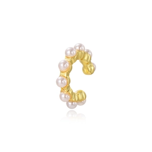 Minimalist gold metal C-shaped cuff earring with elegant white pearls on white background