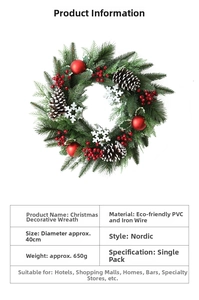 Detail showing 40cm Christmas wreath with pine cones, red berries and snow flakes