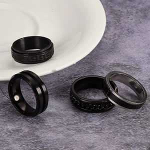 Men's 4-piece black stainless steel ring set with spinning anxiety relief chains