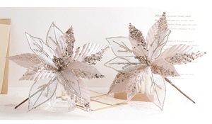 Detail of glittered champagne gold poinsettia flower for elegant Christmas tree decoration