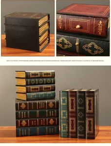 Detail of European vintage book storage box with baroque gold stamping and drawer design