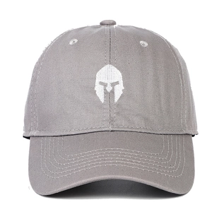Macro detail of high-quality cotton baseball cap with embroidered spartan helmet logo