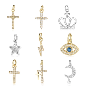 Set of 9 gold and silver charms with zircons for DIY jewelry making in a 3x3 grid