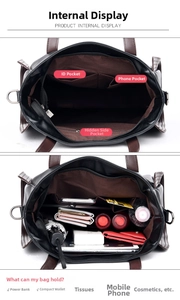 Detailed internal compartments of a black tote bag showing pockets and large storage space