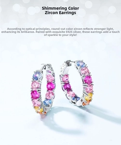 Detailed macro of S925 silver stud earrings with multi-color rainbow cubic zirconia