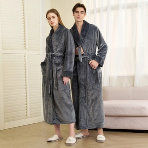 Matching couple's thick grey flannel bathrobes with shawl collars and waist ties