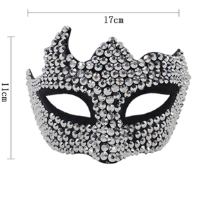 Macro shot of silver rhinestone masquerade mask with 17cm by 11cm dimensions