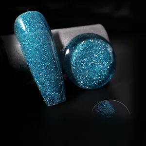 Macro shot of glittery blue diamond nail polish gel with reflective sparkles in shade 007