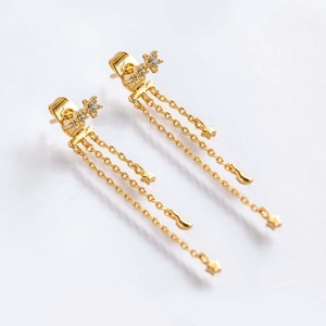 Elegant s925 gold star tassel earrings with moon accents and zircon stones on white background