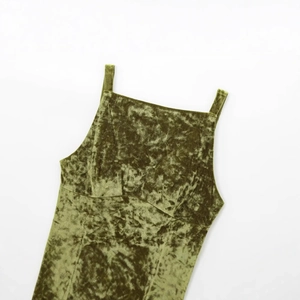Olive green velvet top featuring delicate spaghetti straps and a retro square neckline