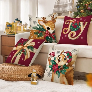 Set of 4 Christmas pillow covers with elk squirrel and JOY wreath on beige sofa