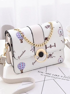 White printed square crossbody bag with world landmark motifs and gold chain strap