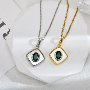 Vintage 18k gold plated necklace with green oval stone and white shell inlay pendant
