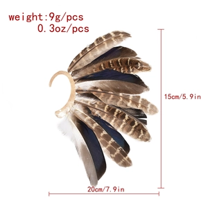 Detail view of vintage peacock feather ear cuff with length and weight measurements