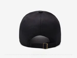 Detail of black cotton baseball cap with adjustable metal buckle on the back strap
