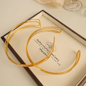 Minimalist French style multilayer golden choker necklace with an open layered metal design