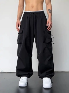 Pantalon cargo noir ample pour hommes avec cordon de serrage et grandes poches