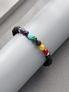 Chakra lava stone bracelet with 8mm volcanic beads and multi-colored faceted gemstones